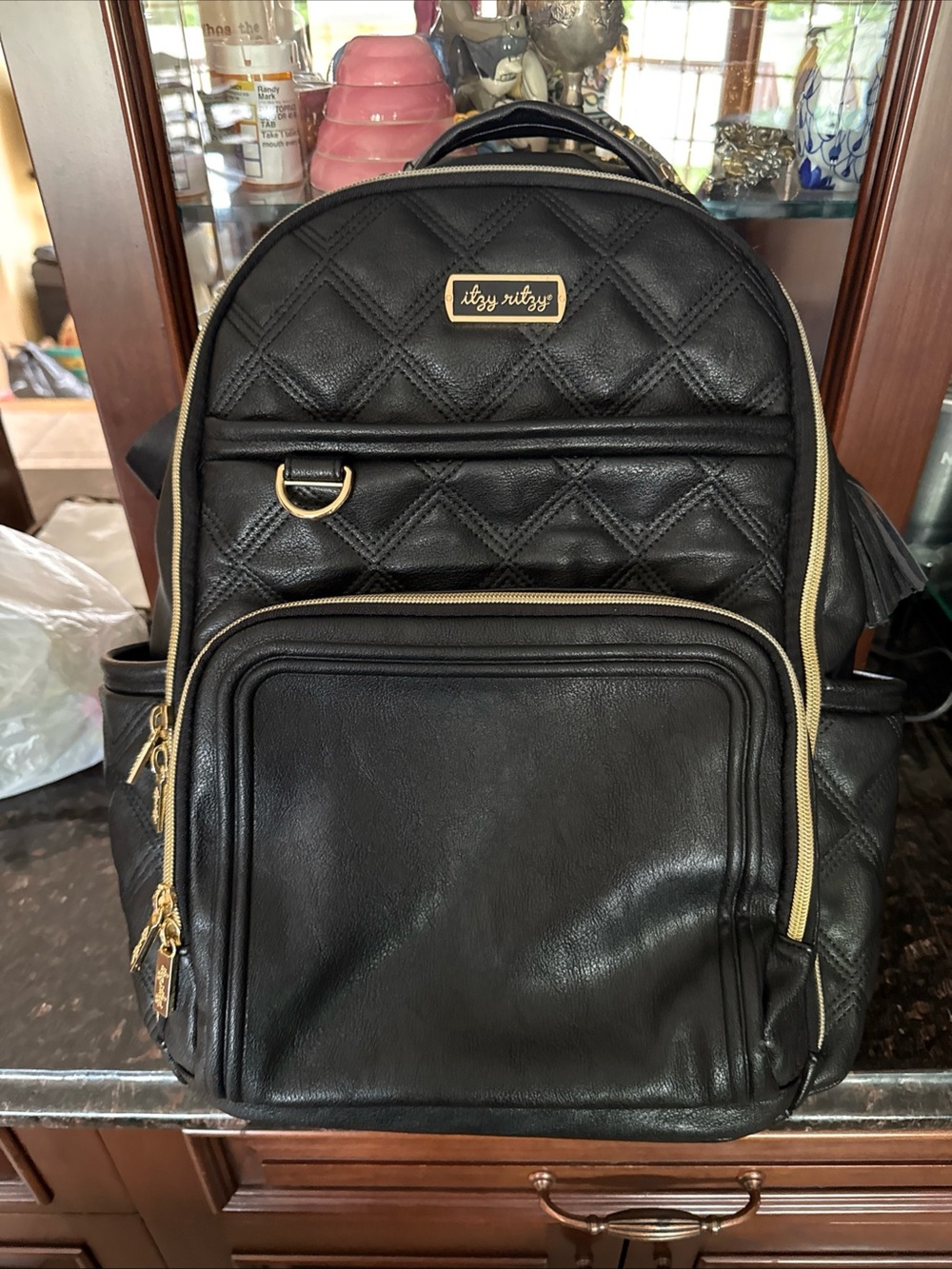 Itzy Ritzy Black Quilted diaper  Backpack with Gold Trim